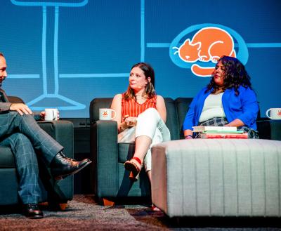 Three presenters onstage at the Best Friends National Conference